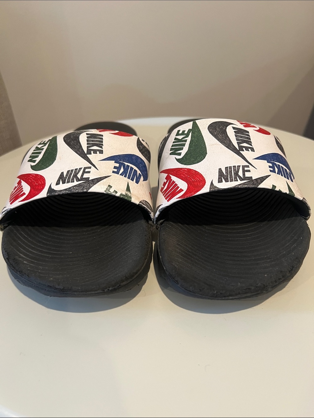 Nike Kids White Slide Sandals with Red, Blue & Green Logos